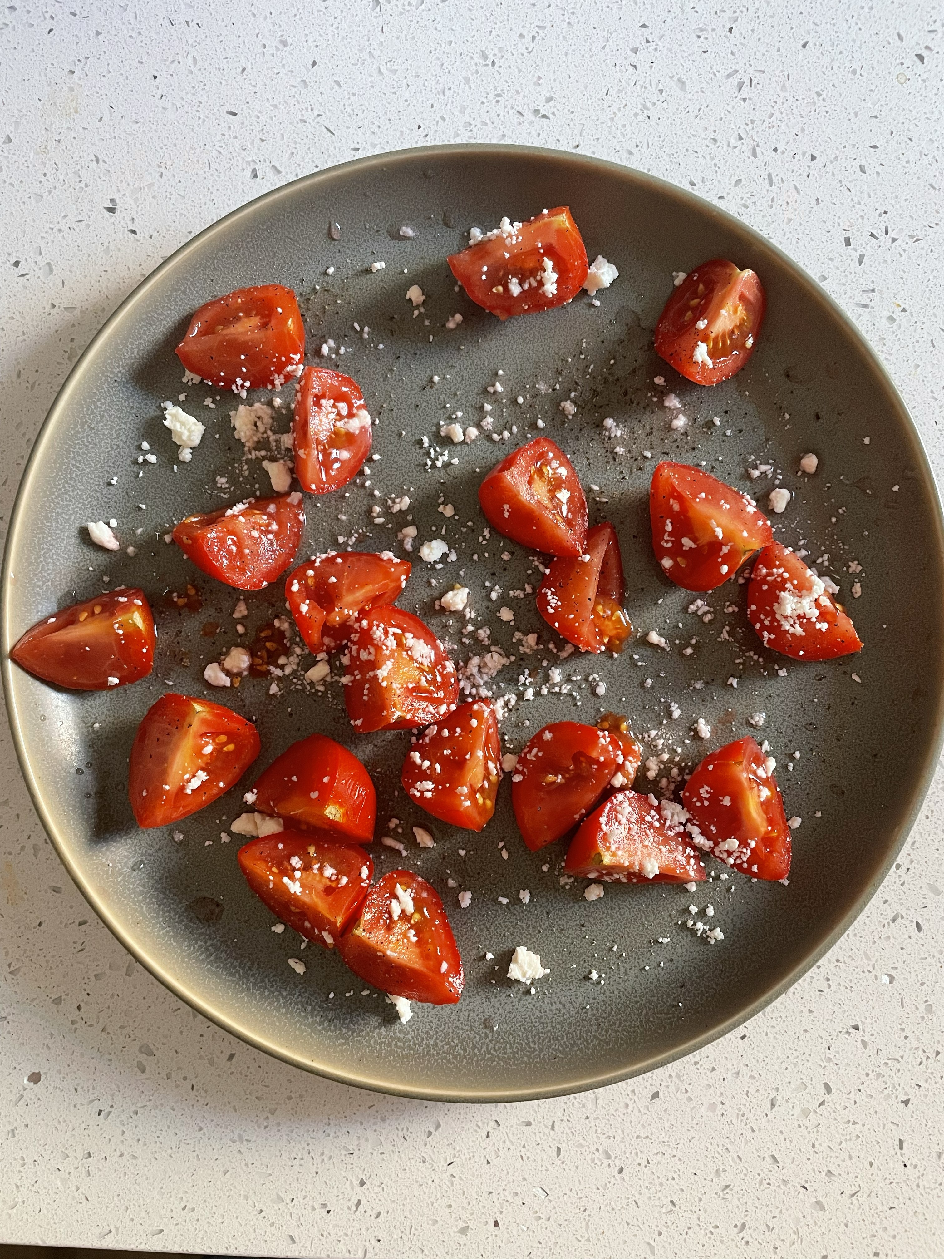 Fresh cherry tomatoes with crumbled feta cheese from Little Italy Mercato in San Diego
